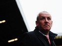 Mark Warburton the Brentford manager looks on before the Sky Bet Championship match between Fulham and Brentford at Craven Cottage on April 3, 2015