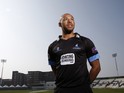 Tymal Mills poses for a portrait during the Sussex County Cricket Photocall at BrightonandHoveJobs.com County Ground on April 9, 2015