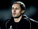 Grimsby manager Paul Hurst looks on ahead of the Skrill Conference Premier League match between Barnet and Grimsby Town at The Hive Stadium on February 18, 2014