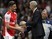 Arsenal's Olivier Giroud shakes hands with boss Arsene Wenger on May 11, 2015