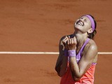 Czech Republic's Lucie Safarova celebrates after winning her match against Serbia's Ana Ivanovic during their women's semi-final match of the Roland Garros 2015 French Tennis Open in Paris on June 4, 2015