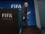 FIFA president Sepp Blatter leaves the stage after announcing his intention to resign on June 2, 2015