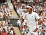Spanish player Rafael Nadal reacts after losing to Serbian player Novak Djokovic during the men's single final at the Wimbledon Tennis Championships at the All England Tennis Club, in southwest London on July 3, 2011