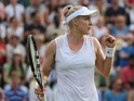 US player Bethanie Mattek-Sands celebrates beating Serbia's Ana Ivanovic in their women's singles second round match on day three of the 2015 Wimbledon Championships at The All England Tennis Club in Wimbledon, southwest London, on July 1, 2015