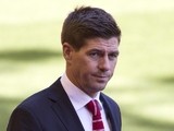 Liverpool's English midfielder Steven Gerrard walks by the pitch before the English Premier League football match between Liverpool and Crystal Palace at the Anfield stadium in Liverpool, Merseyside on May 16, 2015