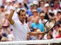 Richard Gasquet of France waves to the crowd after victory in his Gentlemens Singles Third Round match against Grigor Dimitrov of Bulgaria during day five of the Wimbledon Lawn Tennis Championships at the All England Lawn Tennis and Croquet Club on J