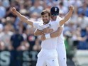 Mark Wood and James Anderson celebrate dismissing Nathan Lyon on day three of the First Test of The Ashes on July 10, 2015