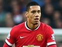 Chris Smalling of Manchester United in action during the Barclays Premier League match between Manchester United and Hull City at Old Trafford on November 29, 2014