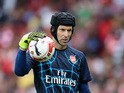 Petr Cech, the Arsenal goalkeeper warms up prior to the Emirates Cup match between Arsenal and Olympique Lyonnais at the Emirates Stadium on July 25, 2015