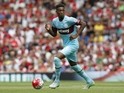 West Ham United's English defender Reece Oxford runs with the ball during the English Premier League football match between Arsenal and West Ham United at the Emirates Stadium in London on August 9, 2015