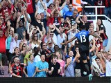 Bournemouth's English striker Callum Wilson celebrates scoring his third goal from the penalty spot during the English Premier League football match between West Ham United and Bournemouth at The Boleyn Ground in Upton Park, East London on August 22, 2015
