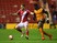 Adam Forshaw of Middlesbrough holds off Bakary Sako of Wolves during the Sky Bet Championship match between Middlesbrough and Wolverhampton Wanderers at Riverside Stadium on April 14, 2015