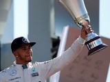  Lewis Hamilton of Great Britain and Mercedes GP lifts the trophy on the podium after winning the Formula One Grand Prix of Italy at Autodromo di Monza on September 6, 2015