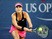 Belinda Bencic of Switzerland returns a shot against Misaki Doi of Japan during their Women's Singles Second Round match on Day Three of the 2015 US Open at the USTA Billie Jean King National Tennis Center on September 2, 2015