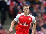 Calum Chambers of Arsenal runs with the ball during the Emirates Cup match between Arsenal and VfL Wolfsburg at the Emirates Stadium on July 26, 2015