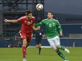 Kyle Lafferty (R) of Northern Ireland and Richard Guzmics (L) of Hungary in action during the Euro 2016 Group F qualifying match at Windsor Park on September 7, 2015 in Belfast, Northern Ireland.