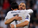 Karim Benzema of Real Madrid celebrates with Cristiano Ronaldo after scoring Real's opening goal during the UEFA Champions League Group A match between Real Madrid and Shakhtar Donetsk at estadio Santiago Bernabeu on September 15, 2015