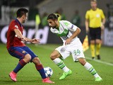 Wolfsburg's Swiss defender Ricardo Rodriguez (R) and CSKA Moscow's Serbian midfielder Zoran Tosic vie for the ball during the UEFA Champions League group B first leg football match between VfL Wolfsburg and CSKA Moscow in Wolfsburg on September 15, 2015