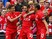 Danny Ings of Liverpool (28) celebrates with team mates as he scores their first goal during the Barclays Premier League match between Liverpool and Norwich City at Anfield on September 20, 2015