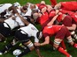 Fiji's and England's players vie in a scrum during a Pool A match of the 2015 Rugby World Cup between England and Fiji at Twickenham stadium in south west London on September 18, 2015.