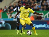 Vurnon Anita of Newcastle United vies with Jeremy Helan of Sheffield Wednesday during the Capital One Cup Third Round match between Newcastle United and Sheffield Wednesday at St James Park on September 23, 2015