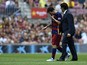 Barcelona's Argentinian forward Lionel Messi (L) leaves the picht after being injured during the Spanish league football match FC Barcelona v UD Las Palmas at the Camp Nou stadium in Barcelona on September 26, 2015