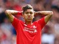 Roberto Firmino of Liverpool rues a missed opportunity during the Barclays Premier League match between Liverpool and West Ham United at Anfield on August 29, 2015