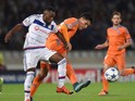Lyon's French defender Samuel Umtiti (L) vies with Valencia's midfielder Dani Parejo (R) during the Champions League group H football match between Lyon and Valencia on September 29, 2015 at the Gerland stadium in Lyon, central-eastern France. 
