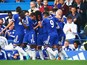 Willian (C) of Chelsea celebrates with team mates after scoring the first goal during the Barclays Premier League match between Chelsea and Southampton at Stamford Bridge on October 3, 2015 in London, United Kingdom.