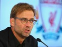 Jurgen Klopp is unveiled as the new manager of Liverpool FC during a press conference at Anfield on October 9, 2015 in Liverpool, England.