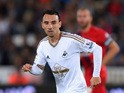 Swansea player Leon Britton in action during the Capital One Cup Second Round match between Swansea City and York City at Liberty Stadium on August 25, 2015