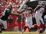 Doug Martin #22 of the Tampa Bay Buccaneers rushes during a game against the Jacksonville Jaguars at Raymond James Stadium on October 11, 2015 in Tampa, Florida.