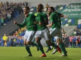 Steve Davis (L) of Northern Ireland celebrates after scoring during the UEFA EURO 2016 qualifier between Northern Ireland and Greece at Windsor Park on October 8, 2015 in Belfast, Northern Ireland. 
