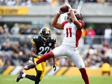 Larry Fitzgerald #11 of the Arizona Cardinals catches a pass in front of William Gay #22 of the Pittsburgh Steelers during the 1st quarter of the game at Heinz Field on October 18, 2015