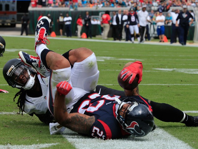 Arian Foster #23 of the Houston Texans crosses the goal line for a touchdown during the game against the Jacksonville Jaguars at EverBank Field on October 18, 2015