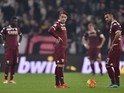 Fabio Quagliarella (R) and Andrea Belotti of Torino FC show their dejection during the Serie A match between Juventus FC and Torino FC at Juventus Arena on October 31, 2015 in Turin, Italy.