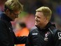 Liverpool's German manager Jurgen Klopp (L) shakes hands with Bournemouth's English manager Eddie Howe ahead of the English League Cup fourth round football match between Liverpool and Bournemouth at Anfield stadium in Liverpool, north west England on Oct