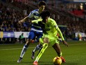 Philip Billing of Huddersfield holds off pressure from Lucas Piazon of Reading during the Sky Bet Championship match between Reading and Huddersfield Town on November 3, 2015