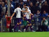 Fiorentina's forward from Croatia Nikola Kalinic (C) celebrates with teammates after scoring during the Italian Seria A football match Sampdoria vs Fiorentina, on November 8, 2015