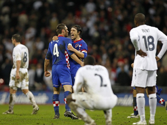Croatian footballers Niko Kovac (3rd R) celebrates with teammate Robert Kovac (2nd L) after Croatia beat England 3-2 in a Group E Euro 2008 Qualifying game at Wembley, in north London, 21 November 2007