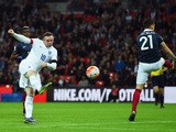 Wayne Rooney of England scores his team's second goal during the International Friendly match between England and France at Wembley Stadium on November 17, 2015