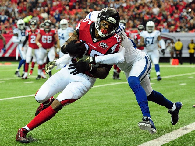 Leonard Hankerson #85 of the Atlanta Falcons scores a touchdown after a catch against Darius Butler #20 of the Indianapolis Colts during the second half at the Georgia Dome on November 22, 2015