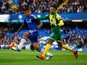 Kenedy of Chelsea and Nathan Redmond of Norwich City compete for the ball during the Barclays Premier League match between Chelsea and Norwich City at Stamford Bridge on November 21, 2015