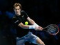Andy Murray of Great Britain hits a backhand during the men's singles match against Stan Wawrinka of Switzerland on day six of the Barclays ATP World Tour Finals at the O2 Arena on November 20, 2015 in London, England.