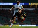Chris Ashton of Saracens dives over to score a try during the Aviva Premiership match between Saracens and Worcester Warriors at Twickenham Stadium on November 28, 2015