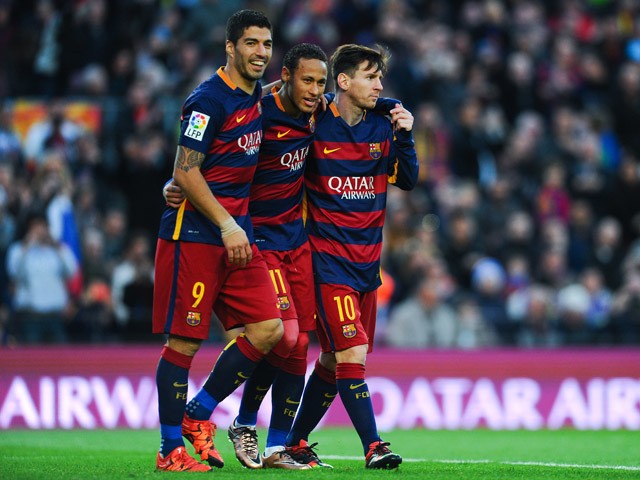 Neymar (C) of FC Barcelona celebrates with his teammates Luis Suarez (L) and Lionel Messi of FC Barcelonaa after scoring his team's third goal of FC Barcelonaduring the La Liga match between FC Barcelona and Real Sociedad de Futbol at Camp Nou on November