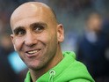 Monchengladbach head coach Andre Schubert watches the warm-up prior to the German first division Bundesliga football match Hertha BSC Berlin vs Borussia Monchengladbach at the Olympic Stadium in Berlin, on October 31, 2015