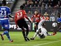 Rennes' French forward Ousmane Dembele (C) kicks the ball during the French L1 football match Rennes against Marseille on December 03, 2015