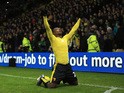 Odion Ighalo of Watford celebrates scoring his team's second goal during the Barclays Premier League match between Watford and Norwich City at Vicarage Road on December 5, 2015