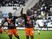 Montpelliers Chadian forward Casimir Ninga (R) celebrates after scoring a goal during the French L1 football match Olympique de Marseille against Montpellier on December 6, 2015 at Velodrome Stadium in Marseille, southern France.